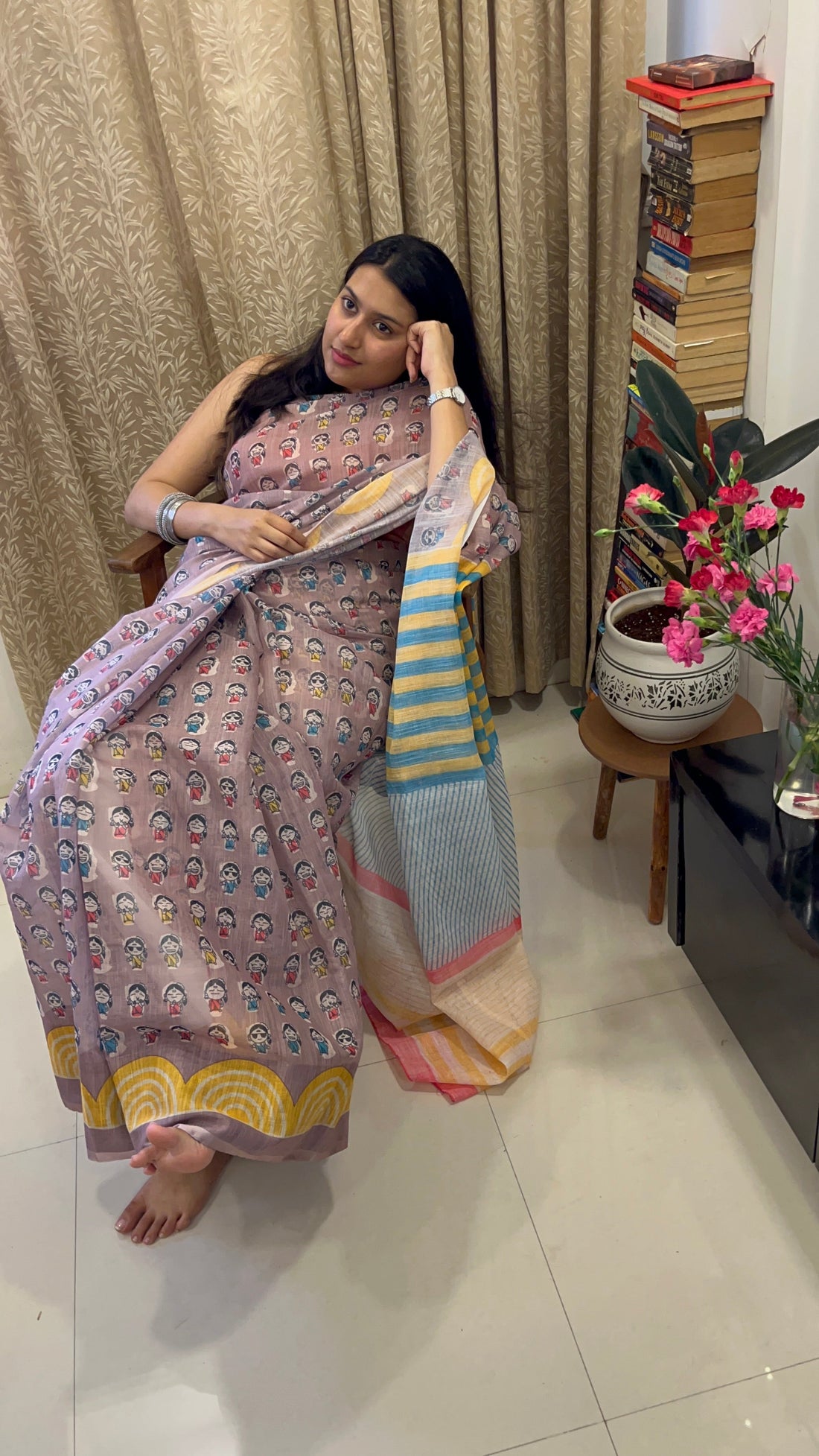 Cotton sarees folded neatly for storage