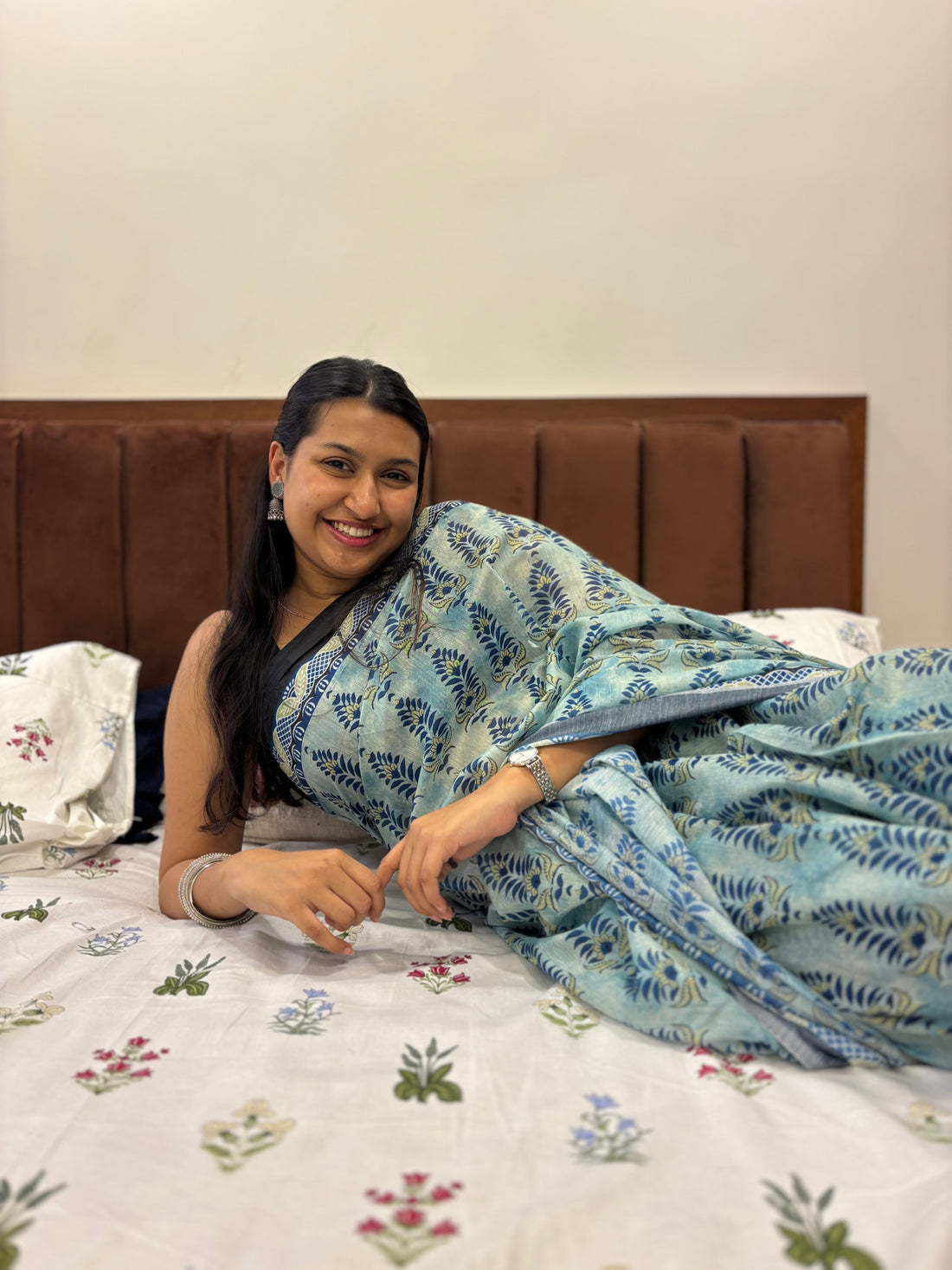 Saree worn without fall bidding with a natural drape