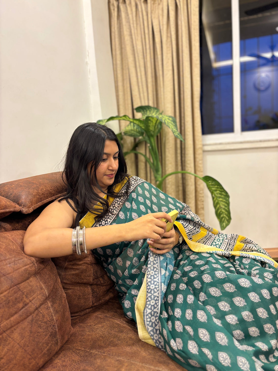 Linen sarees folded neatly for long-term storage