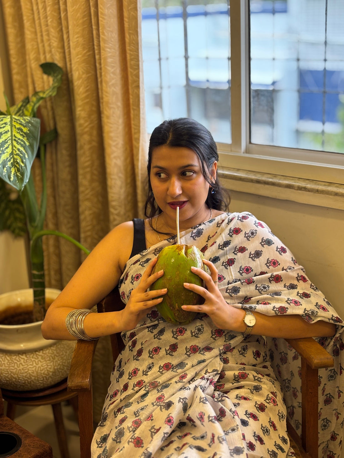Woman wearing a breathable cotton saree for everyday Indian wear
